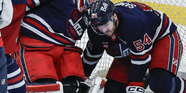 Hellebuyck all smiles in return from knee surgery