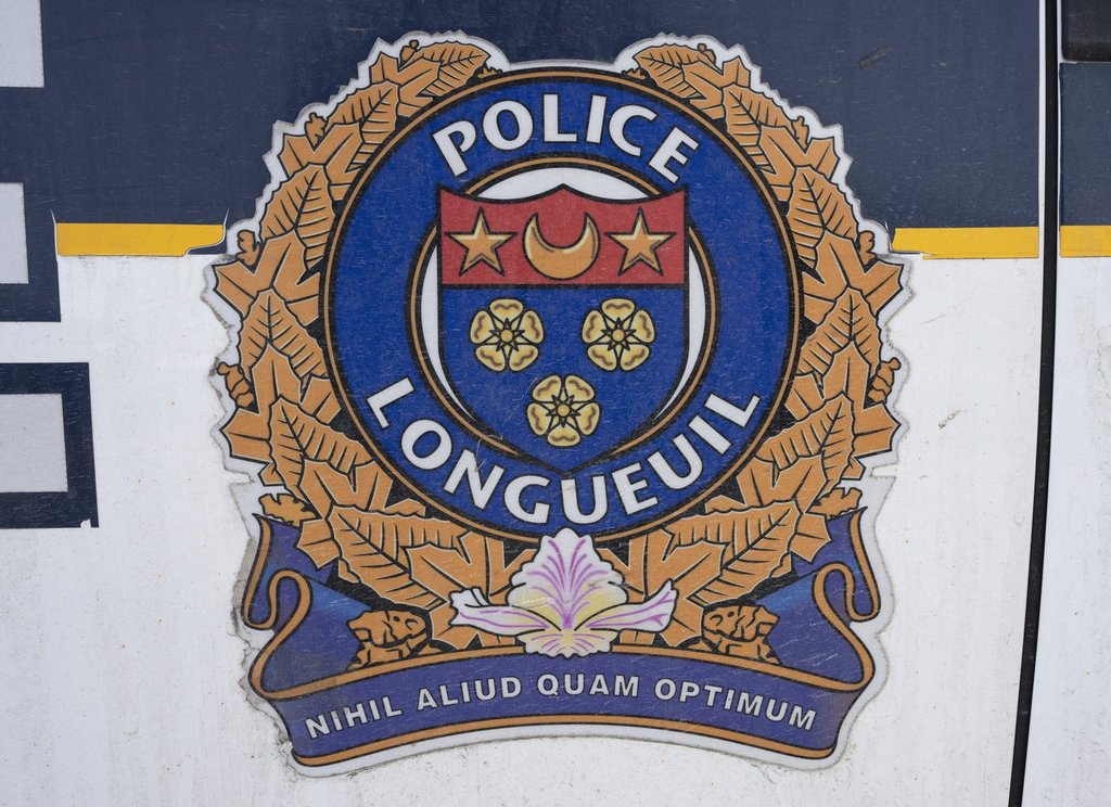 A Longueuil police emblem is seen in Longueuil, Que., Wednesday, Feb. 22, 2023. THE CANADIAN PRESS/Ryan Remiorz.
