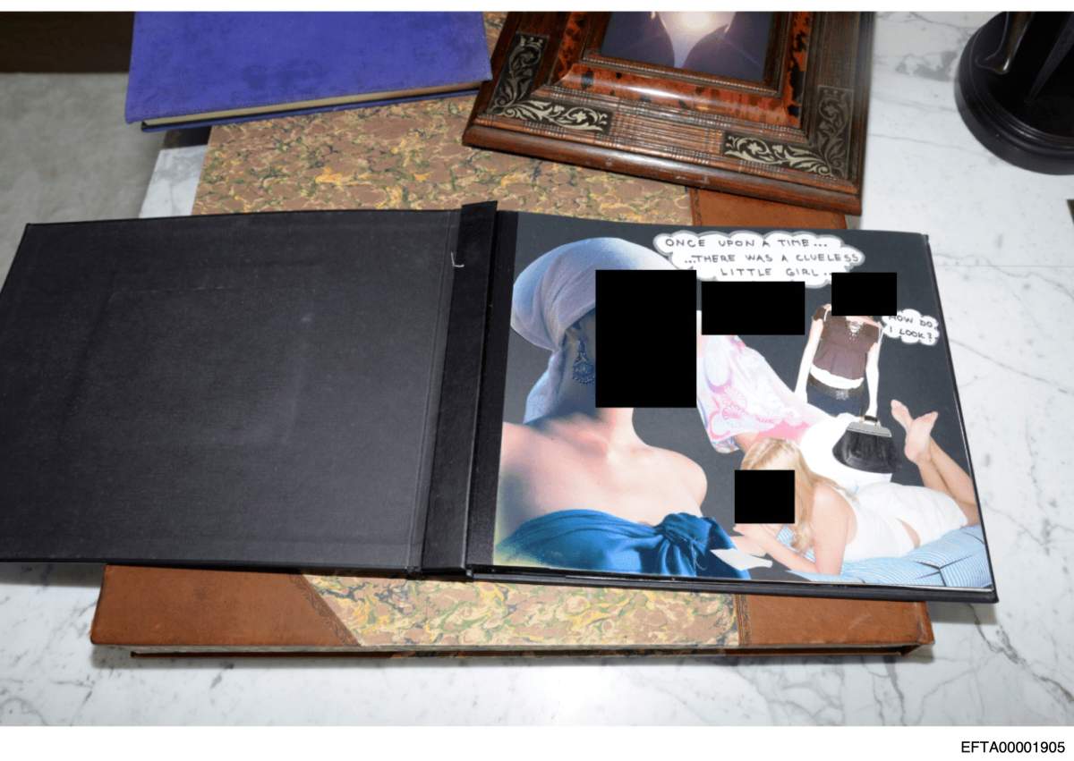 This redacted photo released by the U.S. Department of Justice shows a scrapbook, documented on Aug. 12, 2019, during a search of Jeffrey Epstein's home