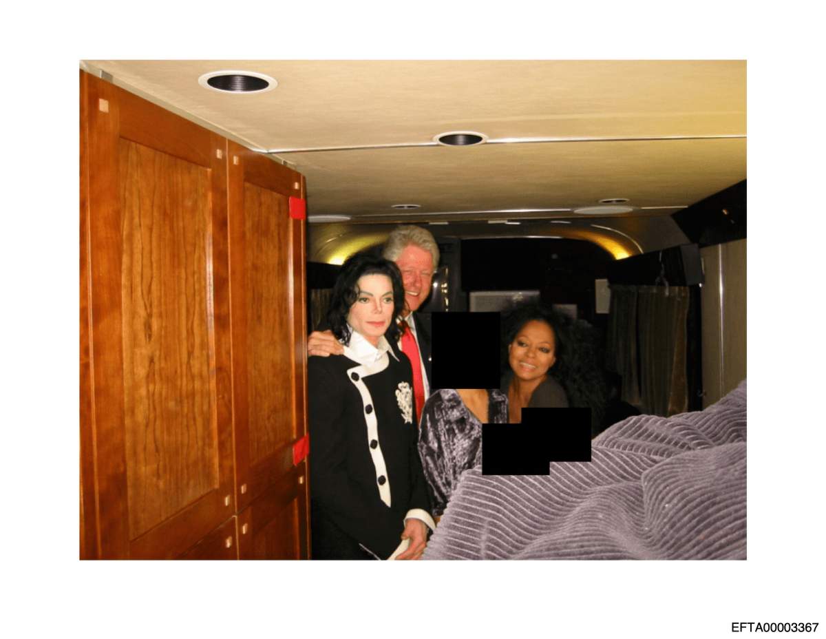 This undated, redacted photo released by the U.S. Department of Justice shows Michael Jackson, former President Bill Clinton and Diana Ross with an unknown per