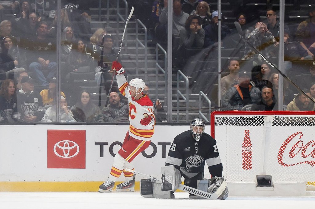 Calgary Flames left wing Jonathan Huberdeau (10) reacts as the Calgary Flames defeat the Los Angeles Kings in overtime of an NHL hockey game Saturday, Dec. 13, 2025, in Los Angeles.