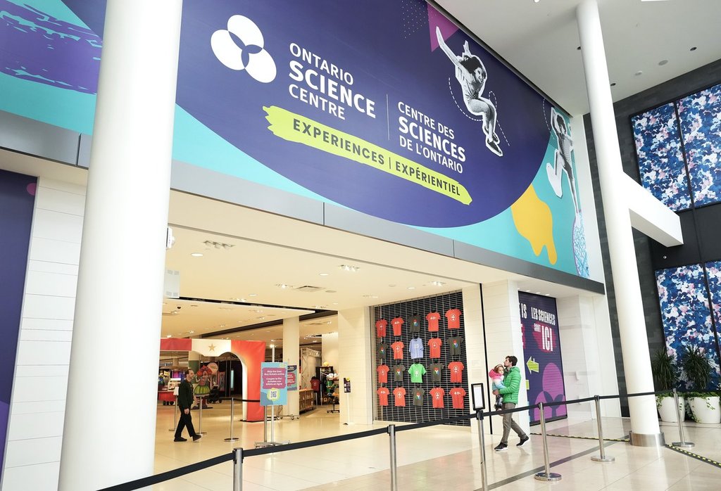 People arrive at a pop-up Ontario Science Centre located in Sherway Gardens mall in Toronto, Tuesday, Dec. 3, 2024. THE CANADIAN PRESS/Nathan Denette.