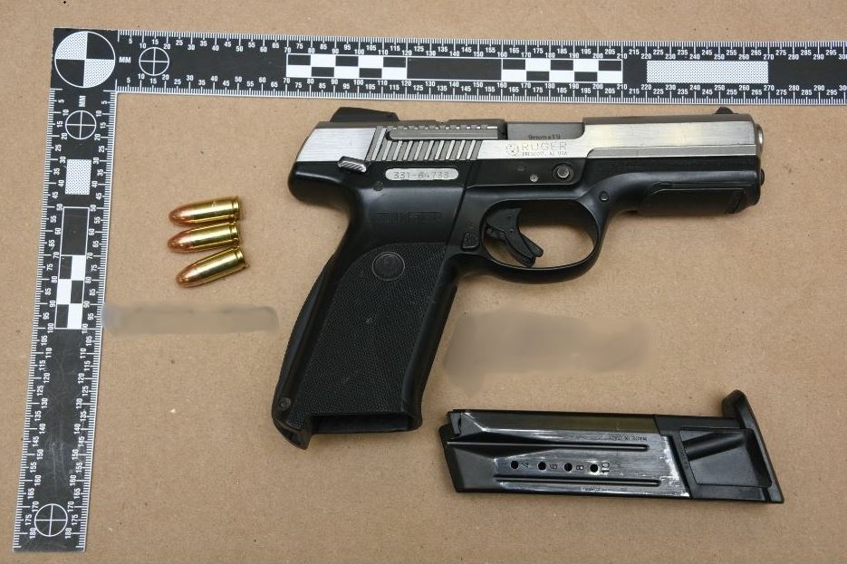 A handgun and ammunition were among the items seized by Calgary police white executing a search warrant on a home in Canyon Meadows, where two people were arrested in connection with an alleged plan to smuggle drugs into Canada from Germany.