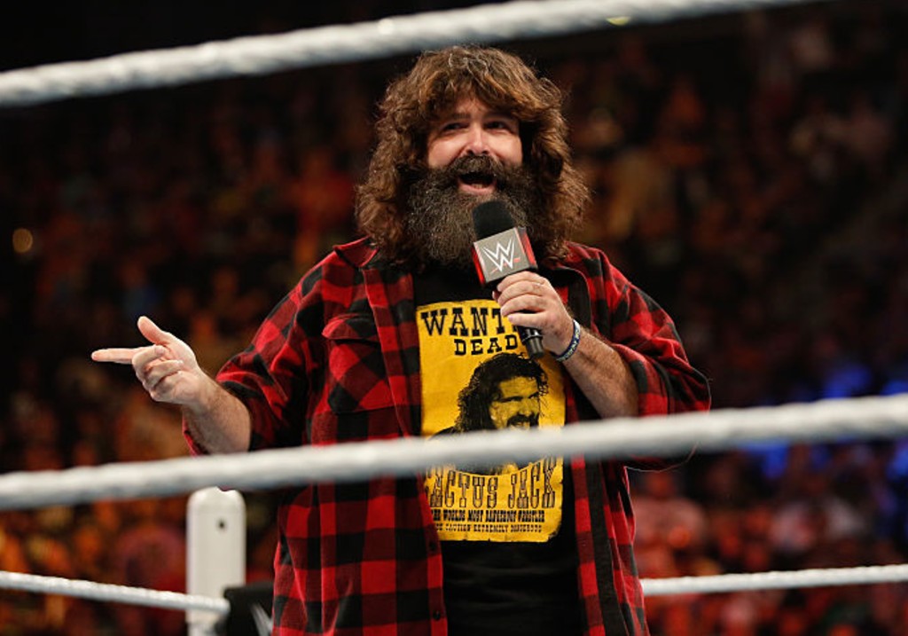 Mick Foley greets the audience at WWE SummerSlam 2015 at Barclays Center of Brooklyn on August 23, 2015 in New York City.