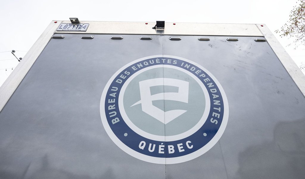 A Bureau des enquêtes indépendantes (BEI) truck is parked in a neighbourhood during an investigation of a police shooting in Longueuil, Que., on Monday, Sept. 22, 2025.