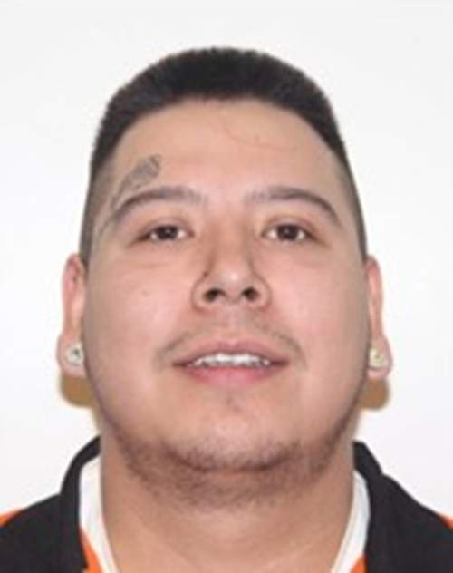 Nicholas Travis Morin, 29, is five feet, nine inches tall, 240 lbs., with brown eyes and black hair. He has multiple tattoos, including a rose above his right eyebrow.