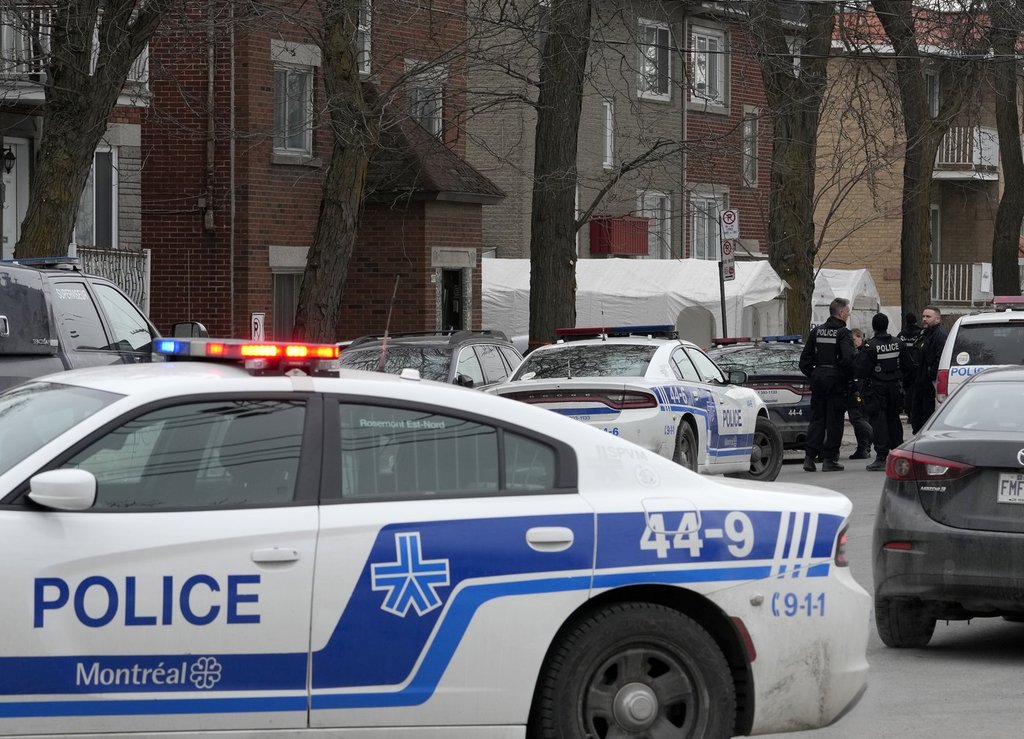 Montreal police attend the scene of a triple stabbing, in Montreal, on Friday, March 17, 2023. THE CANADIAN PRESS/Ryan Remiorz.
