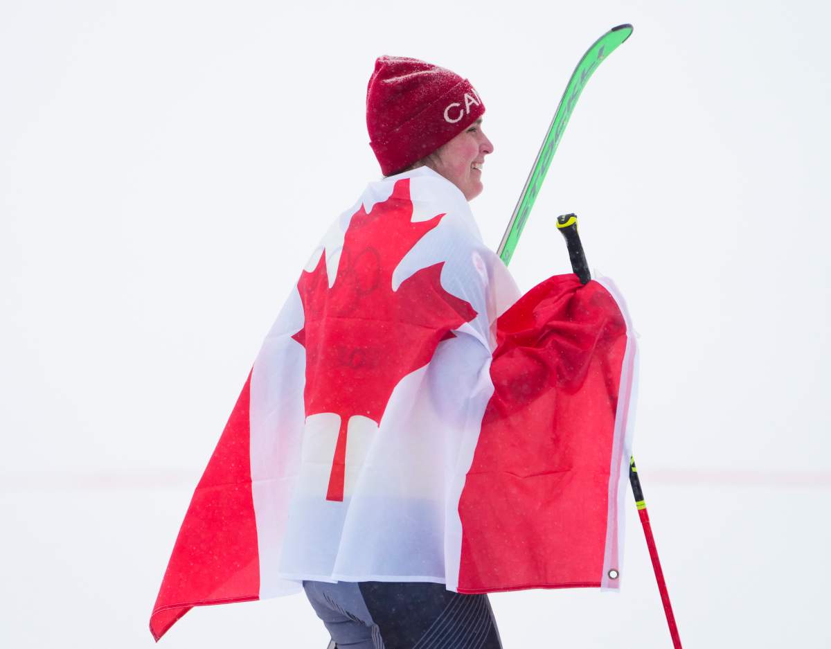 Canada’s Marielle Thompson celebrates taking silver in the freestyle women’s ski cross during the Beijing Winter Olympic Games, in Zhangjiakou, China, Thursday, Feb. 17, 2022.
