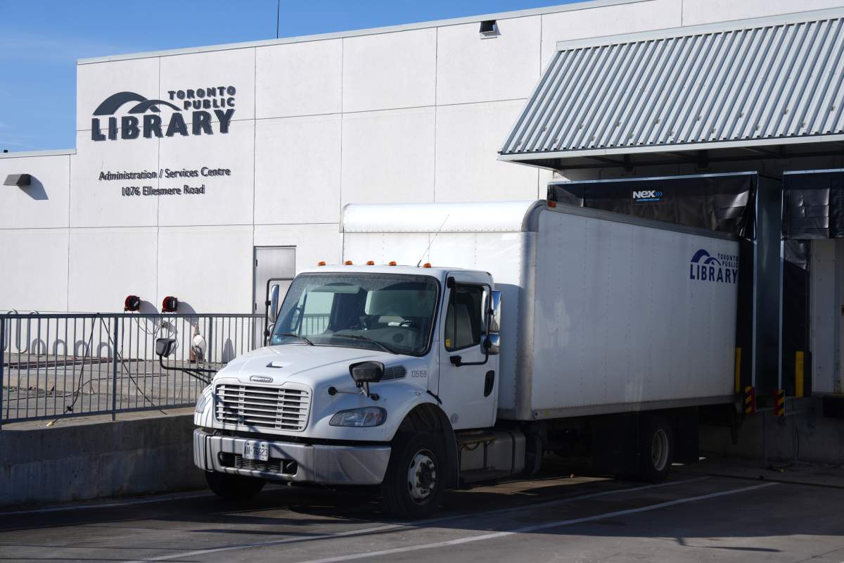 A truck waits at the Toronto Public Library Administration/Services Centre in Scarborough to distribute books to TPL branches on Feb. 26, 2024.