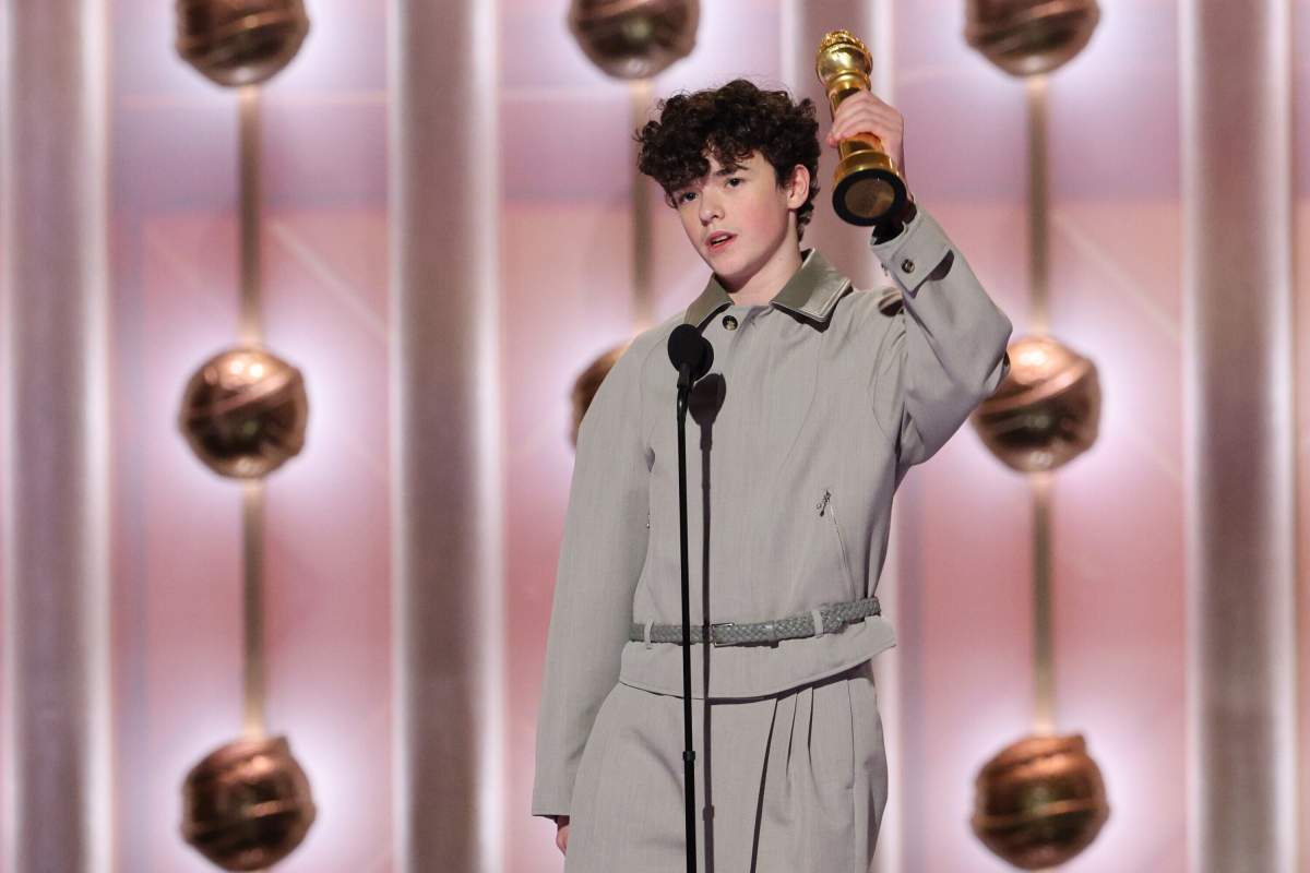 This image released by CBS Broadcasting shows Owen Cooper accepting the award for best performance by a supporting actor on TV for 'Adolescence' during the 83rd Golden Globes on Sunday, Jan. 11, 2026, at the Beverly Hilton in Beverly Hills, Calif.