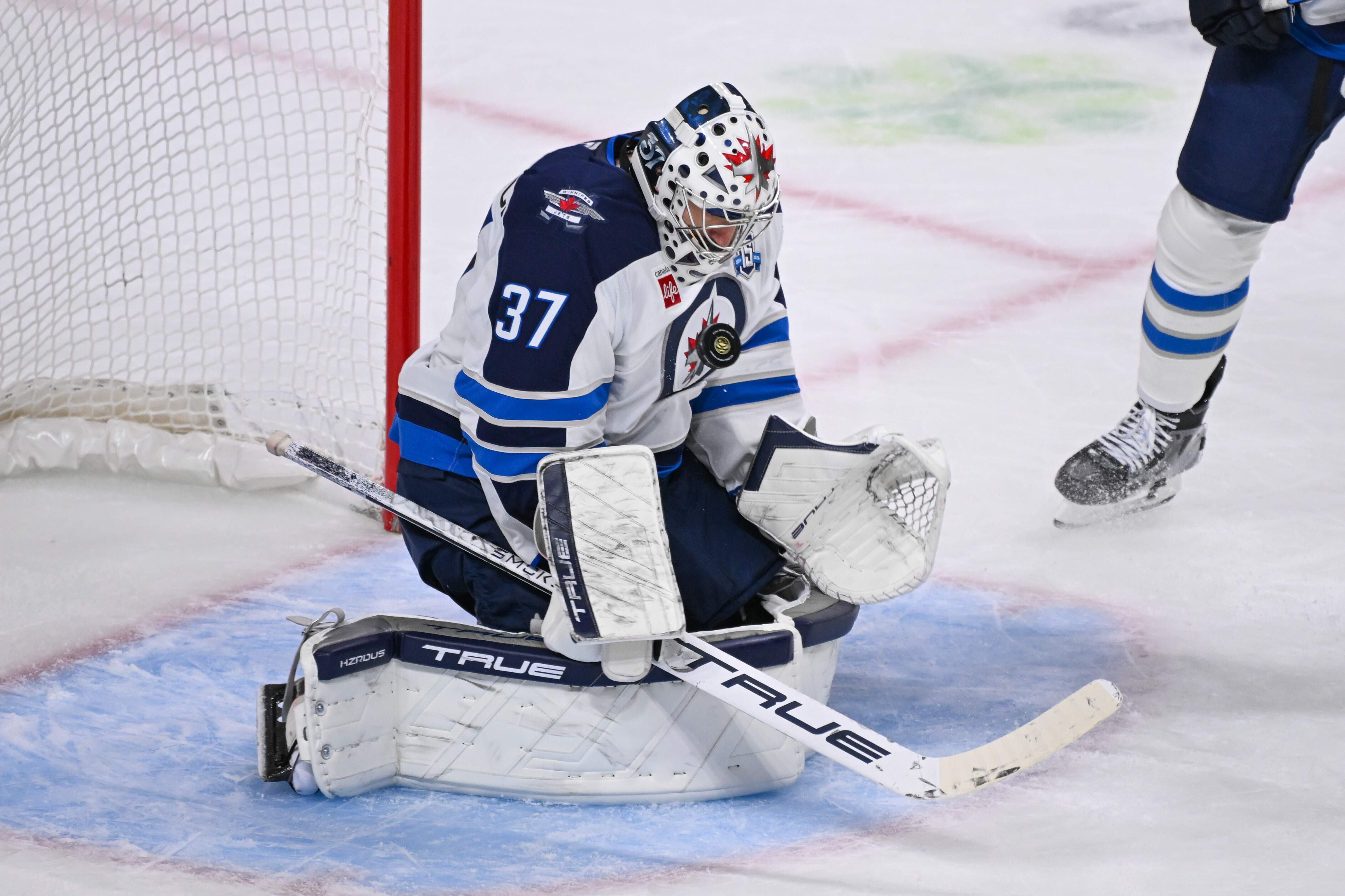 Jets suspend Connor Hellebuyck for failing to report to training camp