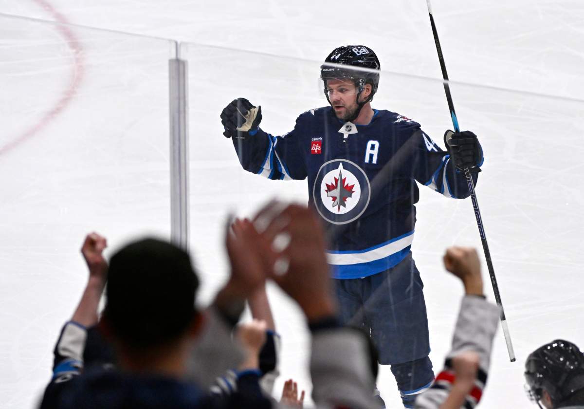 The Winnipeg Jets' Josh Morrissey (44) celebrates his goal against the St. Louis Blues during the first period of their NHL hockey game in Winnipeg, Tuesday, Jan. 20, 2026.
