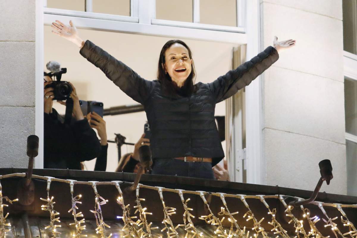 December 11, 2025: Venezuelan opposition leader Maria Corina Machado, winner of the 2025 Nobel Peace Prize, acknowledges a crowd of people from the balcony of Grand Hotel Oslo after arriving in the Norwegian capital in the small hours of Dec. 11, 2025. The award ceremony took place the previous day, with her daughter Ana Corina Sosa Machado attending on her behalf. (Credit Image: © Kyodonews via ZUMA Press)