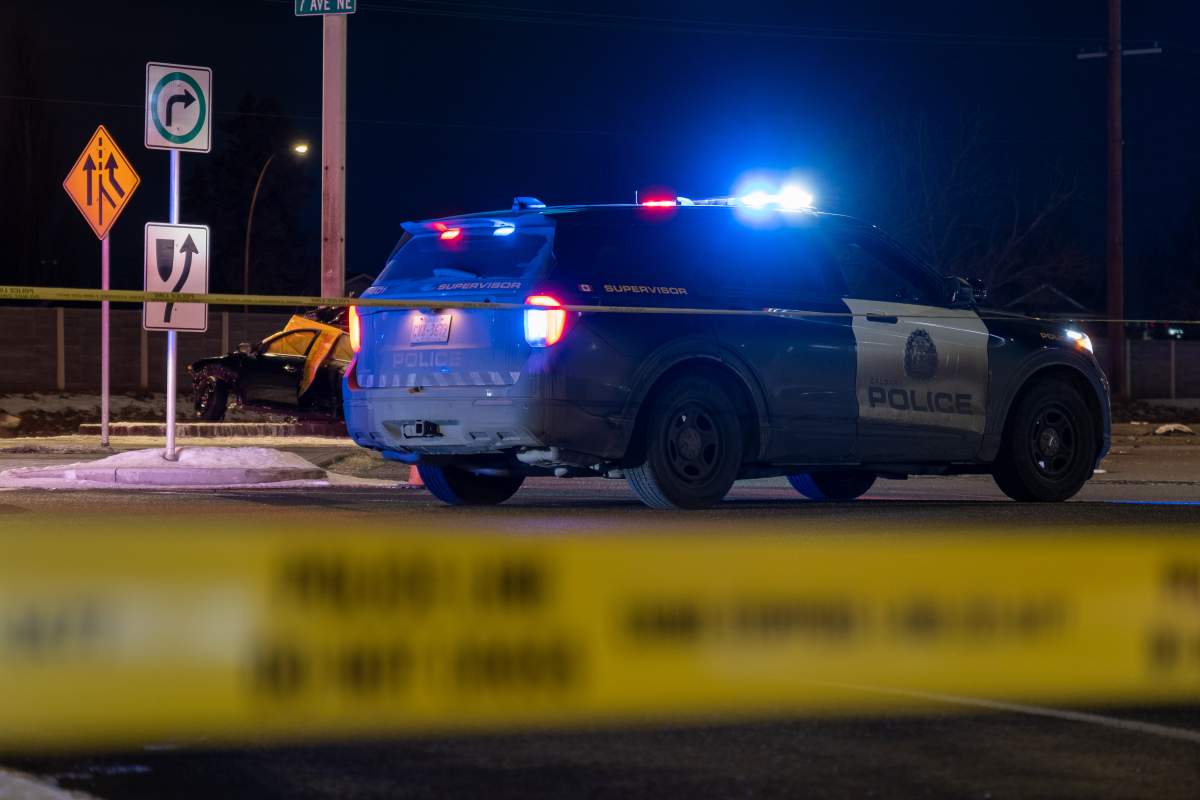 A Calgary Police Service patrol vehicle blocks off an intersection as part of a traffic investigation