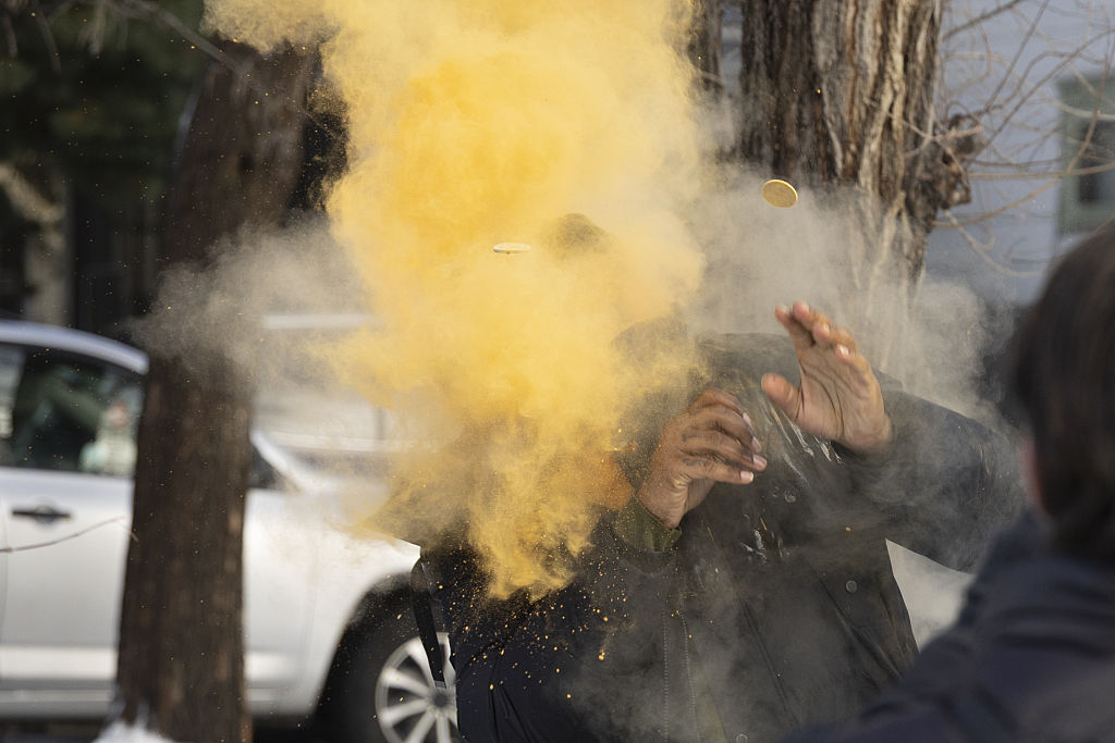 A protesting man is shot point-blank in the face with what appears to be a marker round or a rubber bullet at the scene where ICE agents fatally shoot a woman earlier in the day in Minneapolis, Minnesota, United States, on January 7, 2026.