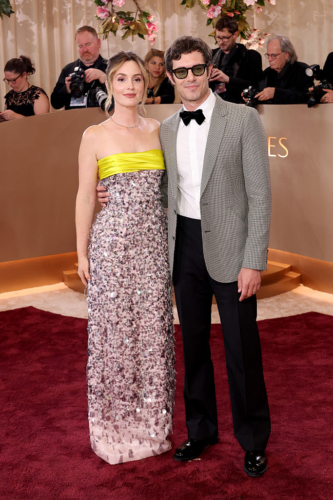 Leighton Meester and Adam Brody attend the 83rd Annual Golden Globe Awards.