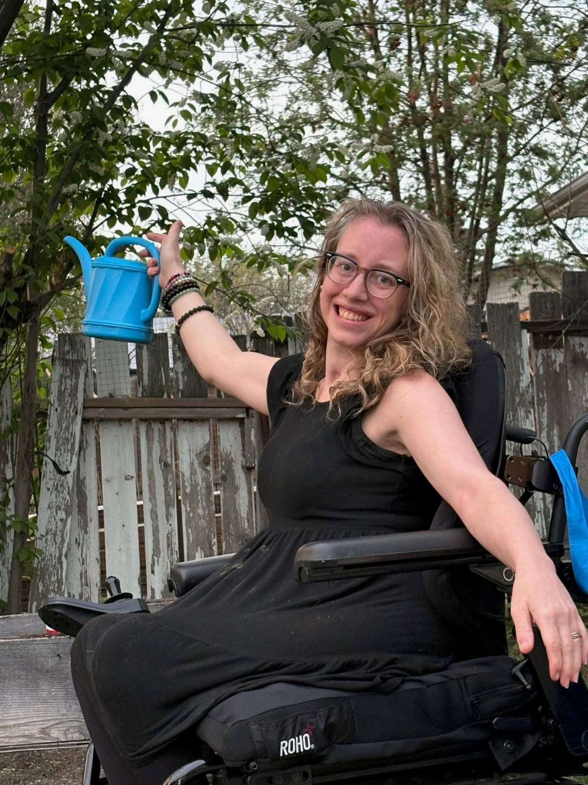 Jocelyn Dennis enjoying gardening in her back yard.