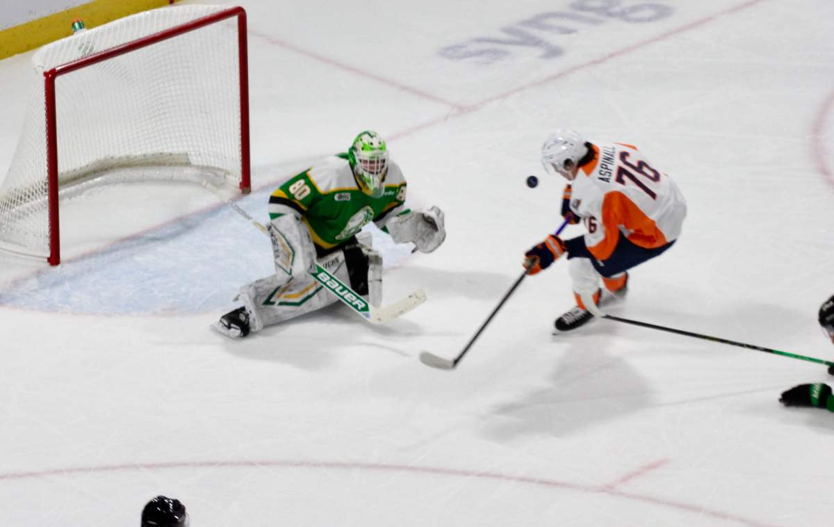 London Knights goaltender Seb Gatto stops Flint Firebirds forward Nathan Aspinall on a breakaway in a game plated at Canada Life Place on Jan. 2, 2026.