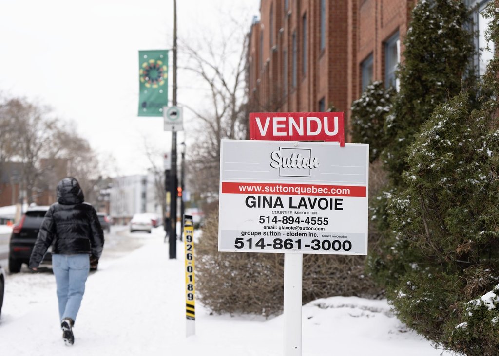 A real estate sign shows a sold condo in Montreal on Monday, March 24, 2025. THE CANADIAN PRESS/Christinne Muschi.