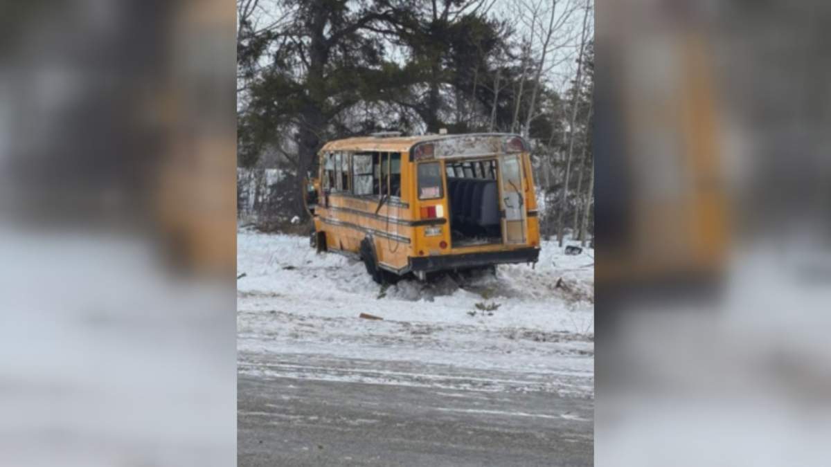 A damaged bus sits off of Highway 10 after RCMP say it rolled over while carrying several children. At least four people are dealing with significant but non-life-threatening injuries. 