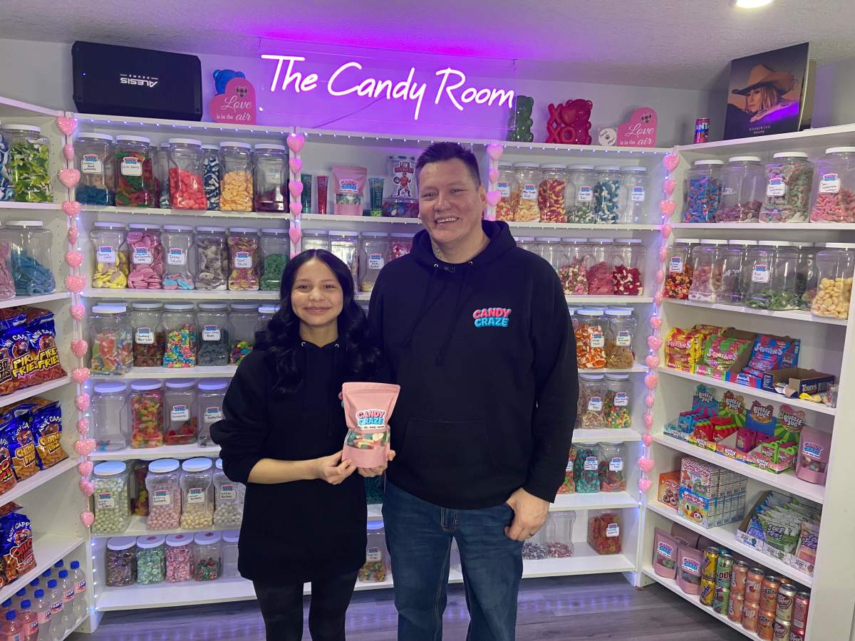 Lylah Janvier, 12, with her dad Lorenzo Janvier in the candy room seen in their Candy Craze TikTok and Facebook videos.