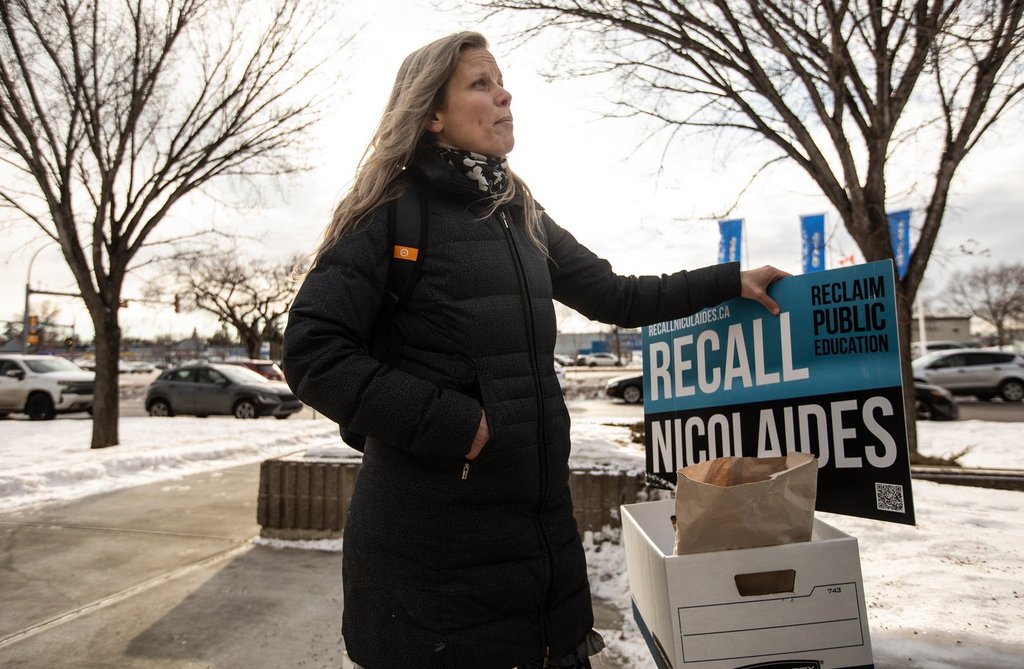 Jenny Yeremiy speaks to media about her petition against Education Minister Demetrios Nicolaides outside the Elections Alberta office, in Edmonton, on Tuesday, Jan. 20, 2026.