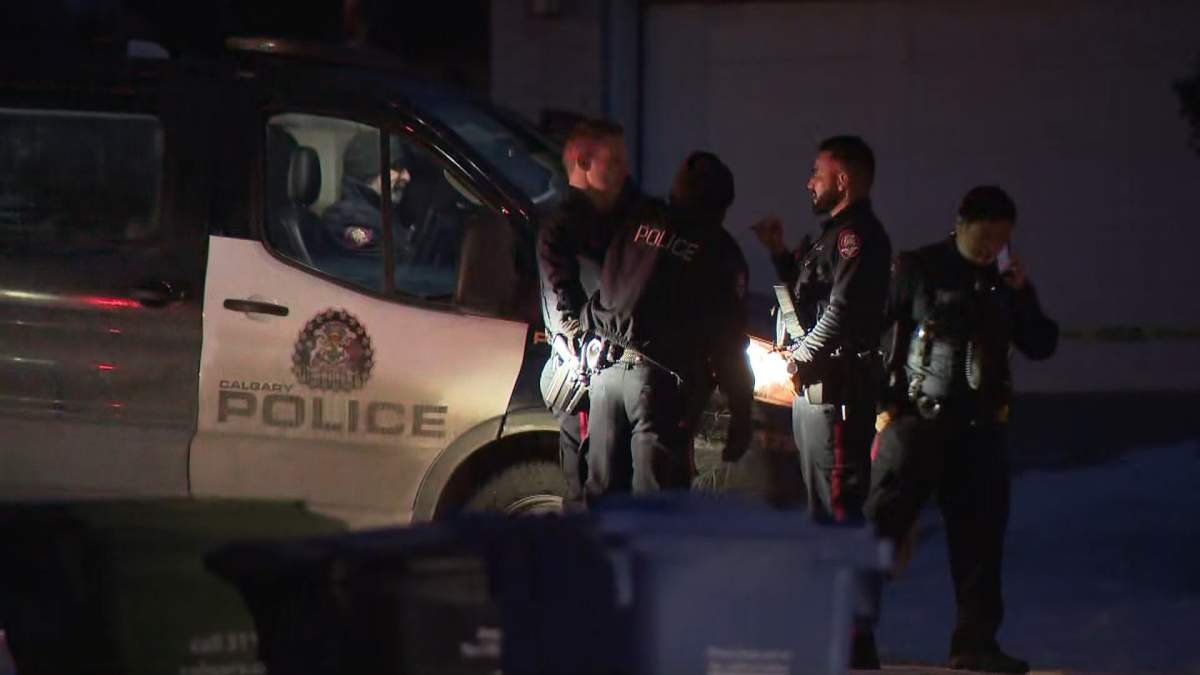 A large contingent of police is seen outside a home on Edgemont Court on Friday, Jan. 9, where a man was killed in what investigators say was a case of self defence.