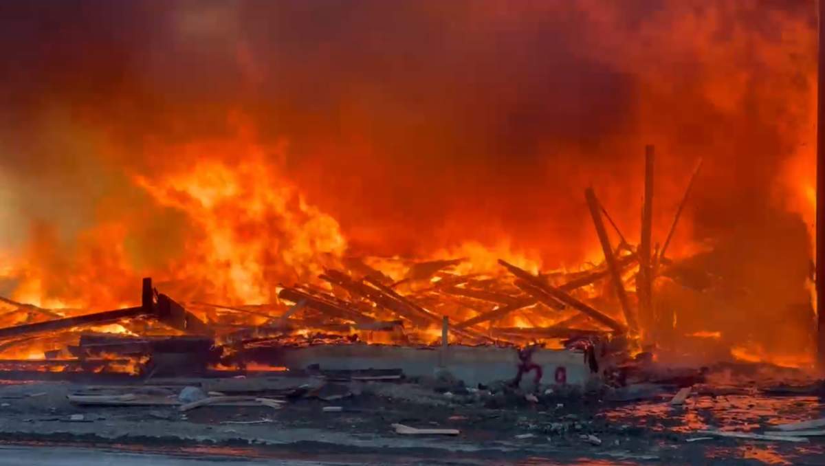 Around 3:55 p.m. the Rocky View County Fire Department said the fire was under control. But by that time the house was little more than a pile of burning wood.