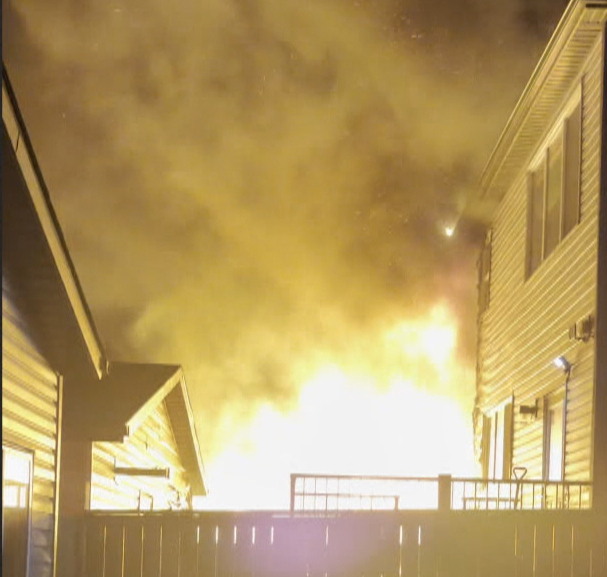 Calgary firefighters were greeted by a wall of flames and smoke when they arrived at house fire on Corner Gate Place early Wednesday morning.