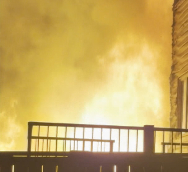 The Calgary fire departments says nine people were evacuated from the two homes affected by the early morning fire.