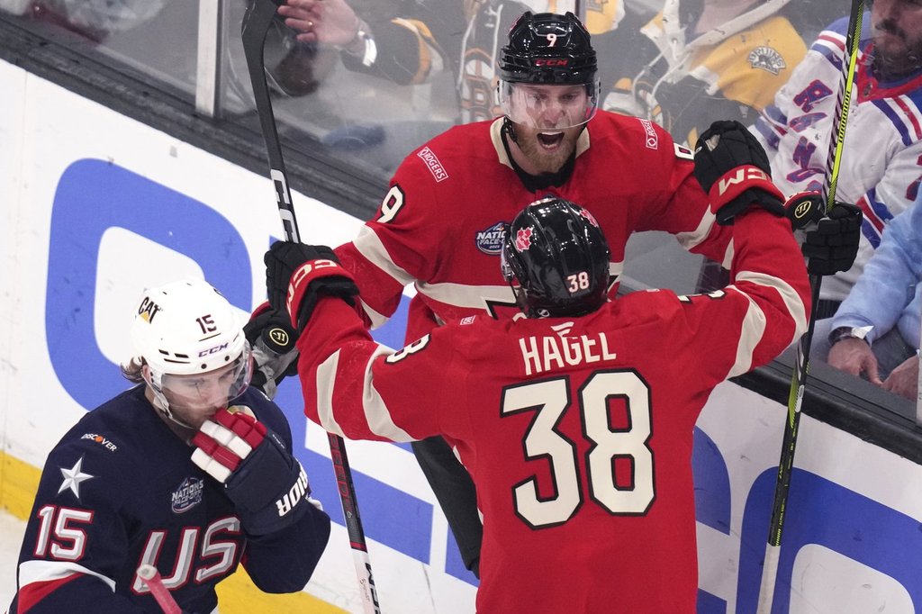 Canada's Sam Bennett (9) celebrates his goal against the United States in the 4 Nations Face-Off final in Boston on Thursday, Feb. 20, 2025. (AP Photo/Charles Krupa).