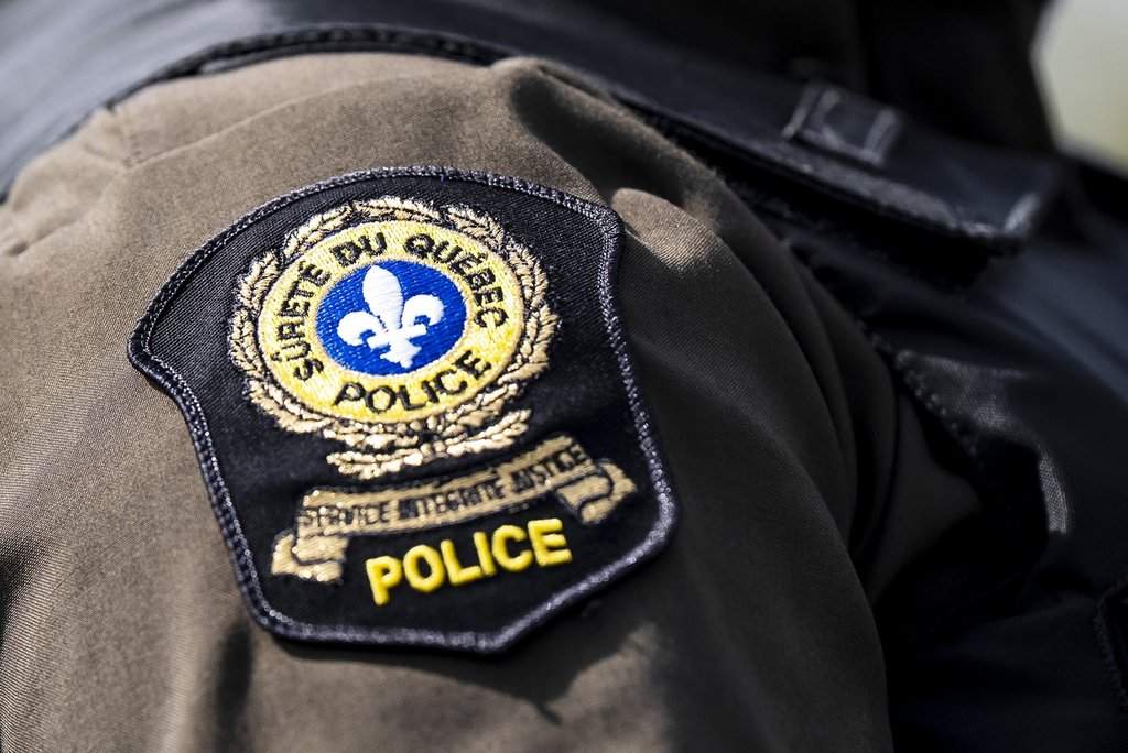 The Quebec provincial police badge is seen during an operation in Vaudreuil-Dorion, Que., on Wednesday, Sept. 17, 2025. THE CANADIAN PRESS/Christopher Katsarov.