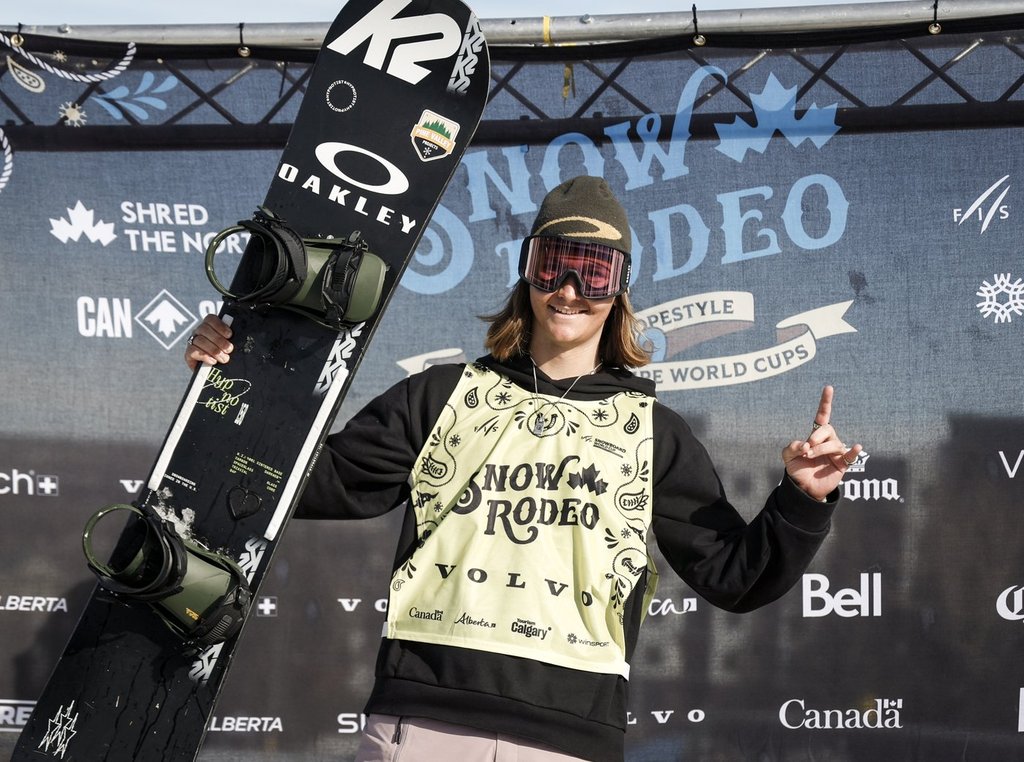 Canada's Cameron Spalding celebrates winning the leaders bib following the men's World Cup slopestyle snowboard event in Calgary, Alta., Saturday, Feb. 22, 2025. THE CANADIAN PRESS/Jeff McIntosh.