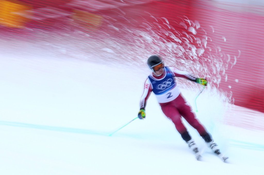 Canada's James Crawford arrives at the finish area of an alpine ski, men's downhill official training, at the 2026 Winter Olympics, in Bormio, Italy, Friday, Feb. 6, 2026. (AP Photo/Rebecca Blackwell).