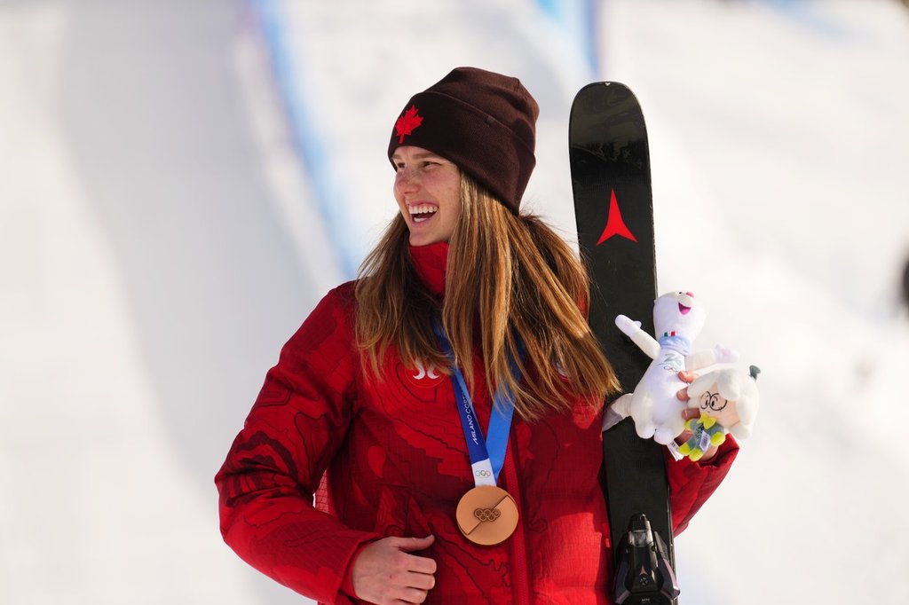 Megan Oldham, of Canada, reacts after winning the bronze medal in the women's freeski slopestyle final at the Milano Cortina 2026 Winter Olympic Games in Livigno, Italy on Monday, Feb. 9, 2026. THE CANADIAN PRESS/Sean Kilpatrick.