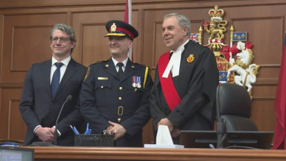 Chief Adam MacIntosh was sworn in Tuesday, promising to modernize the force with body cameras and focus on officer mental health to ensure better community service.