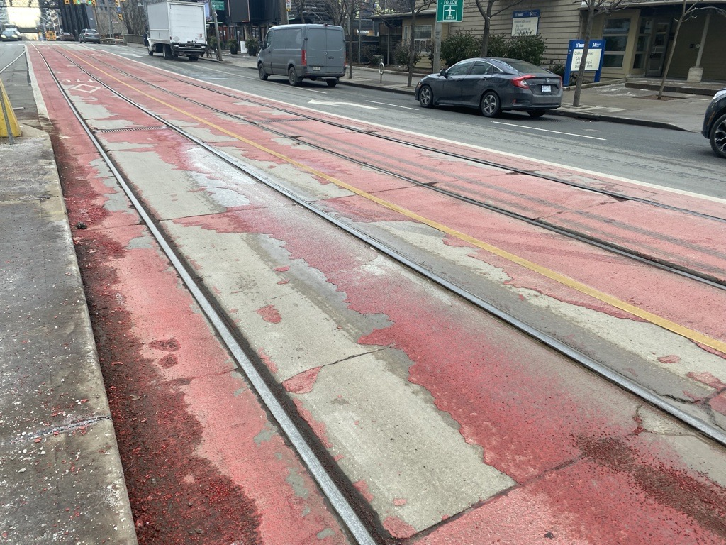 Paint has been peeling off the priority lanes on Bathurst Street.