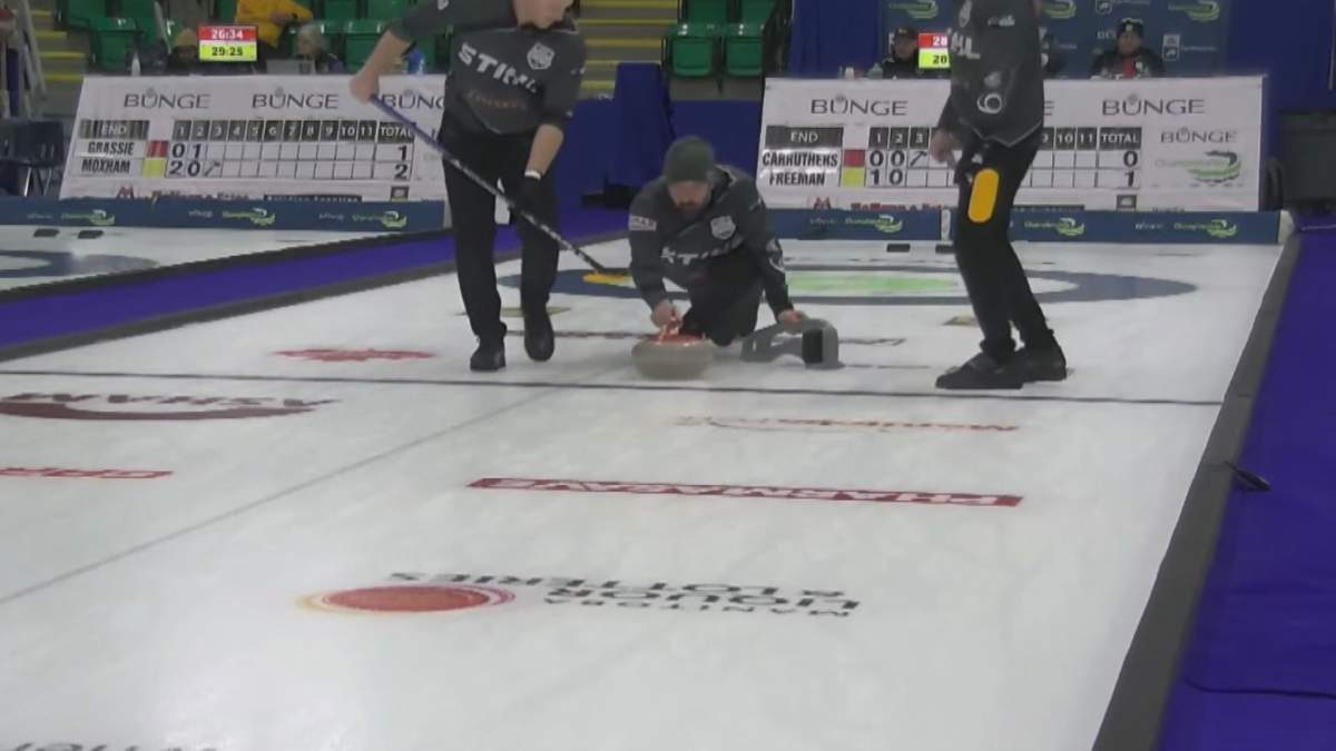 Reid Carruthers throws a rock in their game against Jace Freeman on Thursday at the Bunge Championship in Selkirk.