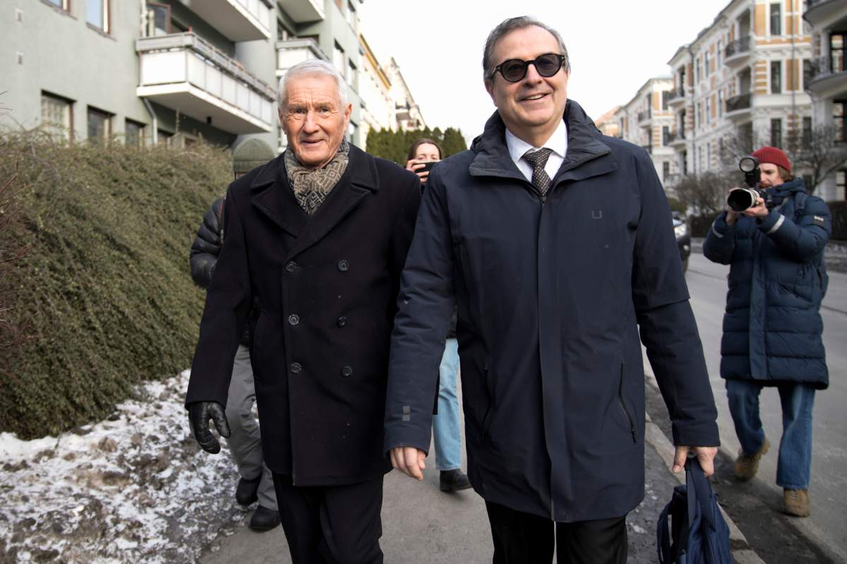 Norway's Former Prime Minister Thorbjorn Jagland, left, walks with his lawyer Anders Brosveet as the Norwegian Economic Crime Investigation Service searches his apartment in Oslo, Norway, Thursday Feb. 12, 2026.