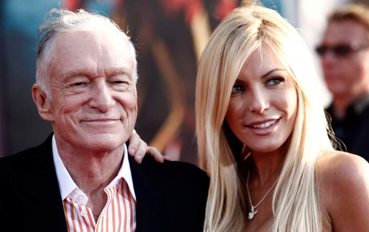 Hugh Hefner, left, and Crystal Harris arrives at the premiere of 'Iron Man 2' at the El Capitan Theatre in Los Angeles in this April 26, 2010 file photo.