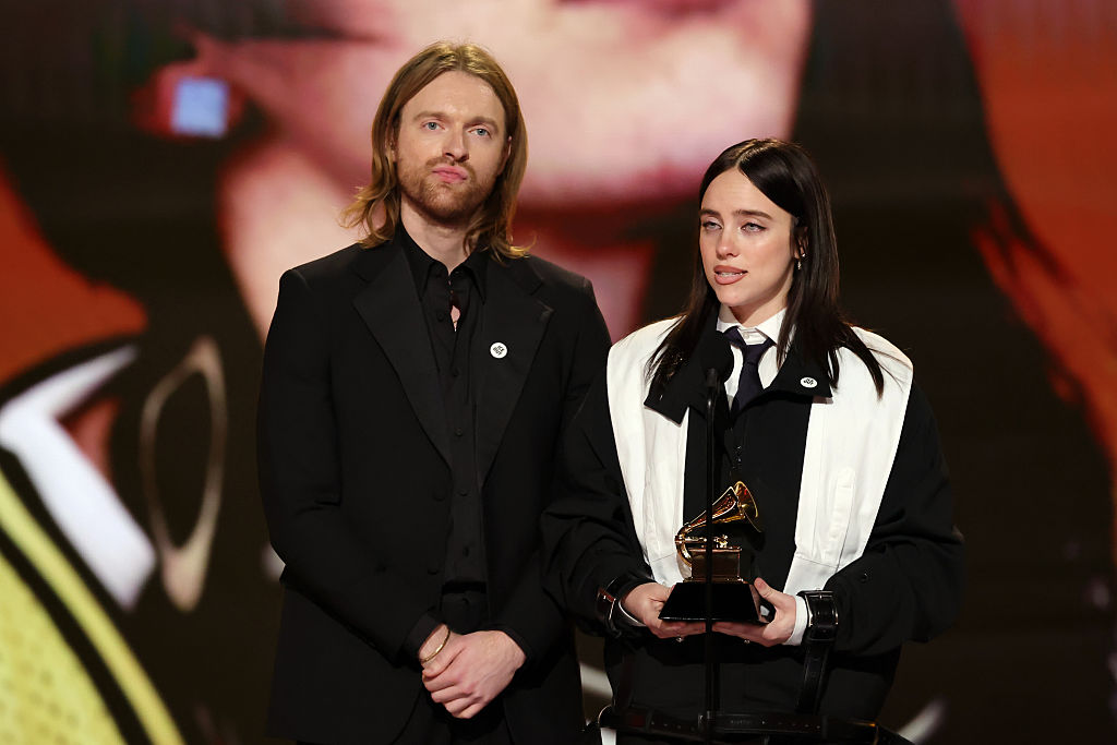 (L-R) Finneas O'Connell and Billie Eilish accept the Song Of The Year award for 'WILDFLOWER' onstage during the 68th GRAMMY Awards at Crypto.com Arena on February 01, 2026 in Los Angeles, California.