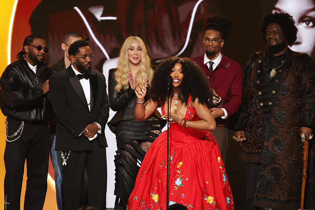 Cher (3rd L) presents the Record Of The Year award for 'luther' to (from L) Sounwave, Jack Antonoff, Kendrick Lamar, SZA, Scott Bridgeway, and Kamasi Washington onstage during the 68th GRAMMY Awards at Crypto.com Arena on February 01, 2026 in Los Angeles, California.