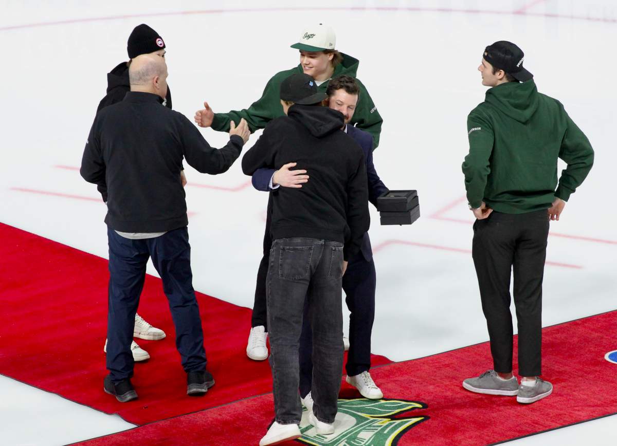 London Knights General Manager Mark Hunter and Associate General Manager Rob Simpson present Sam Dickinson, Kasper Halttunen, Easton Cowan and Denver Barkey with their 2025 Memorial Cup championship rings in a pre-game ceremony at Canada Life Place on Feb. 11, 2026.