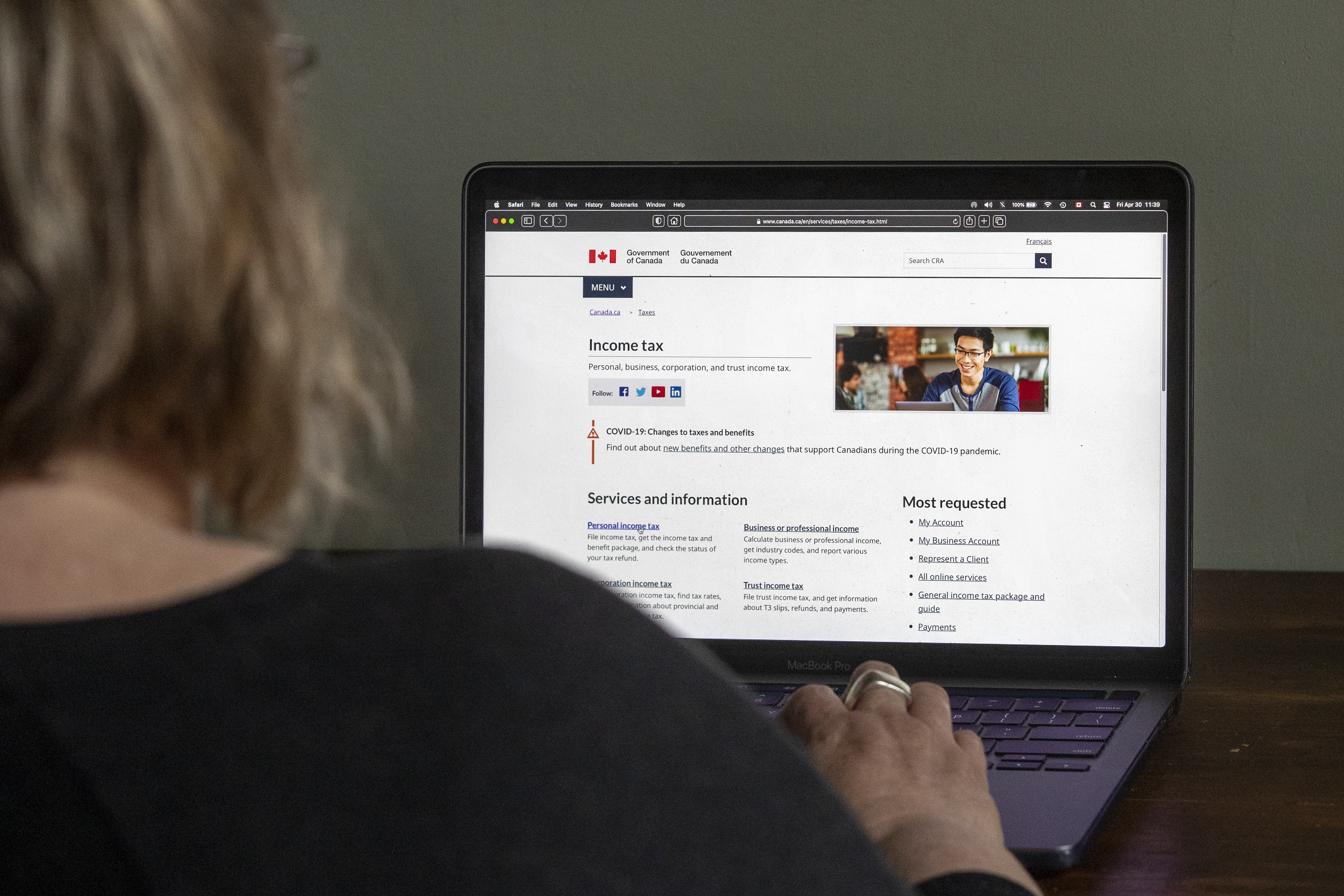 A person looks on the Canada Revenue Agency website pictured on a laptop in Kingston, Ontario on Friday April 30, 2021.