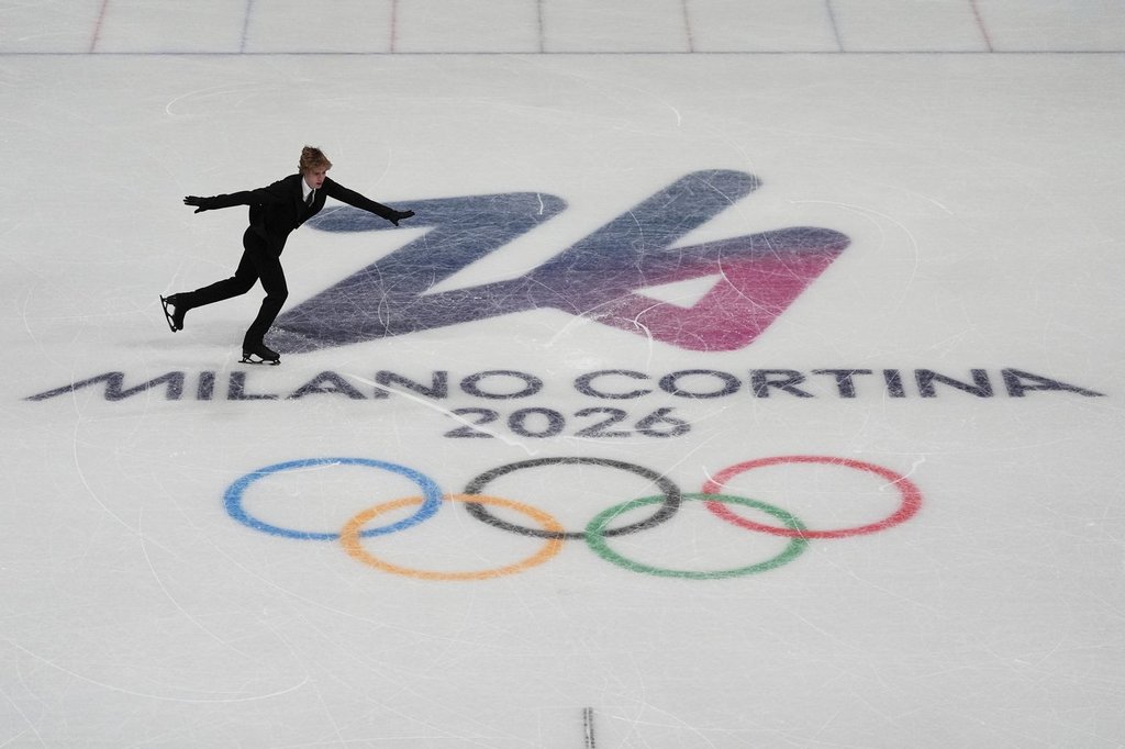 Stephen Gogolev of Canada competes during the figure skating men's team event at the 2026 Winter Olympics, in Milan, Italy, Saturday, Feb. 7, 2026. (AP Photo/Stephanie Scarbrough).