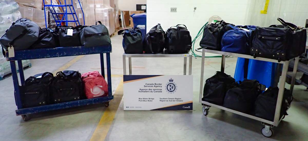 Duffel bags filled with suspected methamphetamine are displayed by the Canada Border Services Agency. The seizure was made Feb. 4.