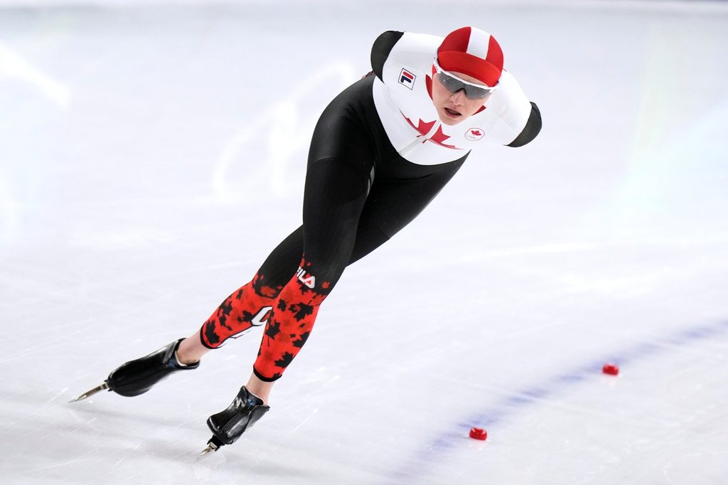 Isabelle Weidemann of Canada competes in the women's 5,000 meters speedskating race at the 2026 Winter Olympics, in Milan, Italy, Thursday, Feb. 12, 2026. (AP Photo/Luca Bruno).