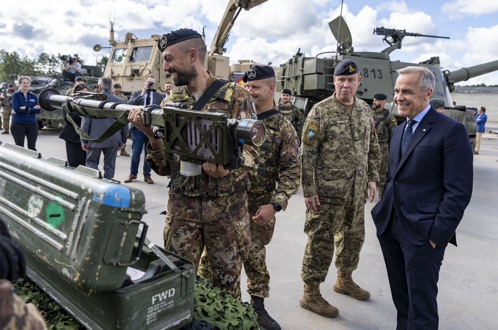 Prime Minister Mark Carney inspects a guided missile intercept system during a vehicle tour at the Adazi Military base in Adazi, Latvia on Wednesday, Aug. 27, 2025. 