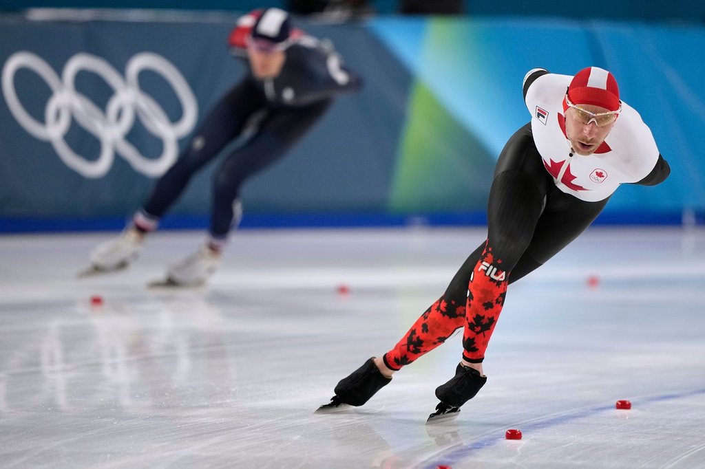 Ted-Jan Bloemen of Canada competes in the men's 5,000 meters speedskating race at the 2026 Winter Olympics, in Milan, Italy, Sunday, Feb. 8, 2026. (AP Photo/Ben Curtis).
