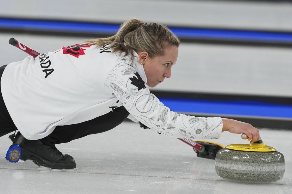 Canada's Rachel Homan in action during the women's curling round-robin session against the United States at the 2026 Winter Olympics in Cortina d'Ampezzo, Italy on Feb. 13, 2026. (AP Photo/Misper Apawu).